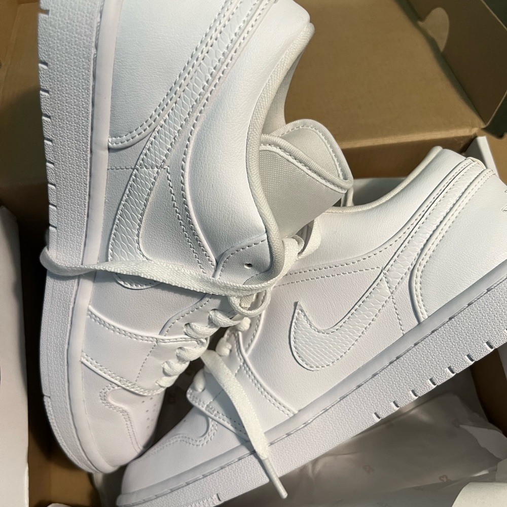 White Air Jordan low top size 9.5 new and never worn